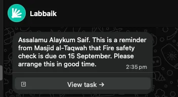 A WhatsApp reminder that the fire safety check is due, with a View task button